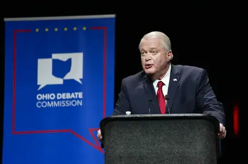 U.S. Senate Republican candidate Mike Gibbons gives a response during Ohio's U.S. Senate Republican Primary debate, March 28, 2022, at Central State University in Wilberforce, Ohio. The first multi-state contest of the 2022 midterm election season takes place Tuesday, May 3. Ohio voters will decide governor nominees and one of the most contentious and expensive Republican U.S. Senate primaries in the nation. (Joshua A. Bickel/The Columbus Dispatch via AP, Pool)