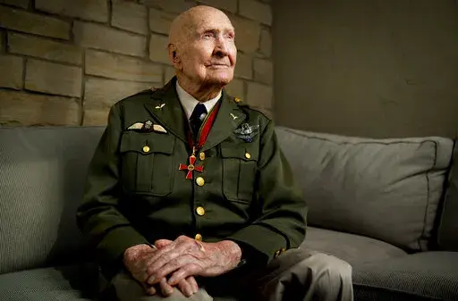 Gail Halvorsen, also know as the "Candy Bomber", poses for a portrait at his son's home in Midway, Utah, on Oct. 7, 2020. The man known as the "Candy Bomber" for his airdrops of sweets during the Berlin Airlift when World War II ended nearly 75 years ago has died. Gail Halvorsen was 101 when he died Wednesday, Feb. 16, 2022, in his home state of Utah surrounded by most of his children after a brief illness, James Stewart, the director of the Gail Halvorsen Aviation Education Foundation, said Thu