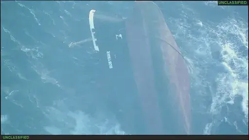 This undated photo released Sunday, March 3, 2024, by the U.S. military's Central Command shows the Belize-flagged vessel Rubymar sinking in the Red Sea. The Rubymar, earlier attacked by Yemen's Houthi rebels, has sunk in the Red Sea after days of taking on water, officials said Saturday, March 2, 2024, the first vessel to be fully destroyed as part of their campaign over Israel's war against Hamas in the Gaza Strip. (U.S. military's Central Command via AP)