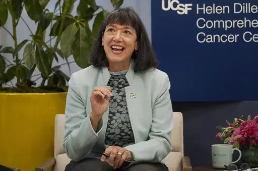 Dr. Monica Bertagnolli speaks at the University of California, San Francisco's cancer center in San Francisco, Friday, Oct. 7, 2022. On Friday, May 19, 2023, The Associated Press reported on stories circulating online incorrectly claiming a White House press release says that Bertagnolli, President Joe Biden’s pick to lead the National Institutes of Health, received tens of millions of dollars in research money from Pfizer. (AP Photo/Jeff Chiu, Pool, File)