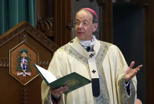 Baltimore Archbishop William Lori leads a funeral Mass in Baltimore on March 28, 2017. The Catholic Archdiocese of Baltimore announced Friday, Sept. 29, 2023, it filed for Chapter 11 reorganization days before a new state law goes into effect removing the statute of limitations on child sex abuse claims and allowing victims to sue their abusers decades after the fact. (AP Photo/Patrick Semansky, File)