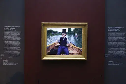 The painting "A Boating Party" by French painter Gustave Caillebotte is displayed at the Orsay Museum, Monday, Jan. 30, 2023 in Paris. France has acquired the stunning impressionist masterpiece for its national collection of art treasures, using a donation from French luxury goods giant LVMH to pay the 43-million euro ($47 million) price tag for Gustave Caillebotte's "A Boating Party." The work, remarkable in its realism, delicate coloring and almost cinematic perspective, as though the artist w